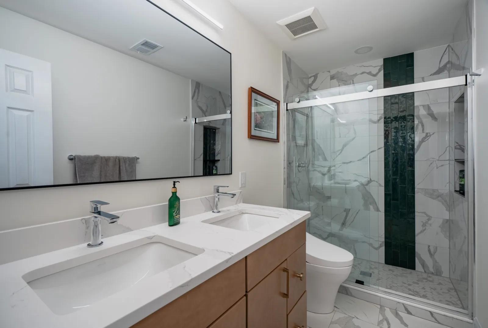 Marble shower with glass door